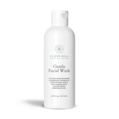 White bottle of Clove Hill Gentle Facial Wash with flip-top cap, 4 oz (115 ml), on a white background on a slight shadow.