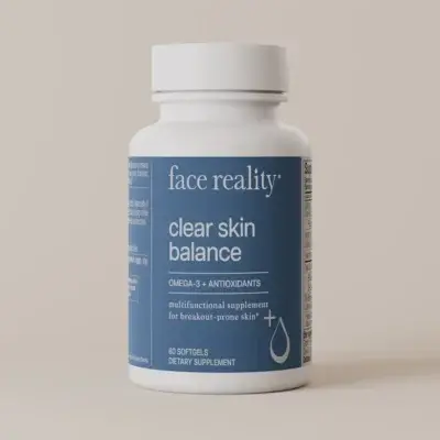 Bottle of Face Reality Clear Skin Balance omega-3 + antioxidants dietary supplement for breakout-prone skin on a beige background